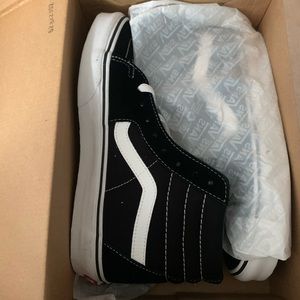 Vans hightop sneaker. Black and white. Size 8/9.5